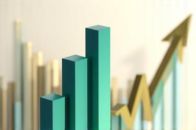 Abstract image showing upward-trending financial charts.